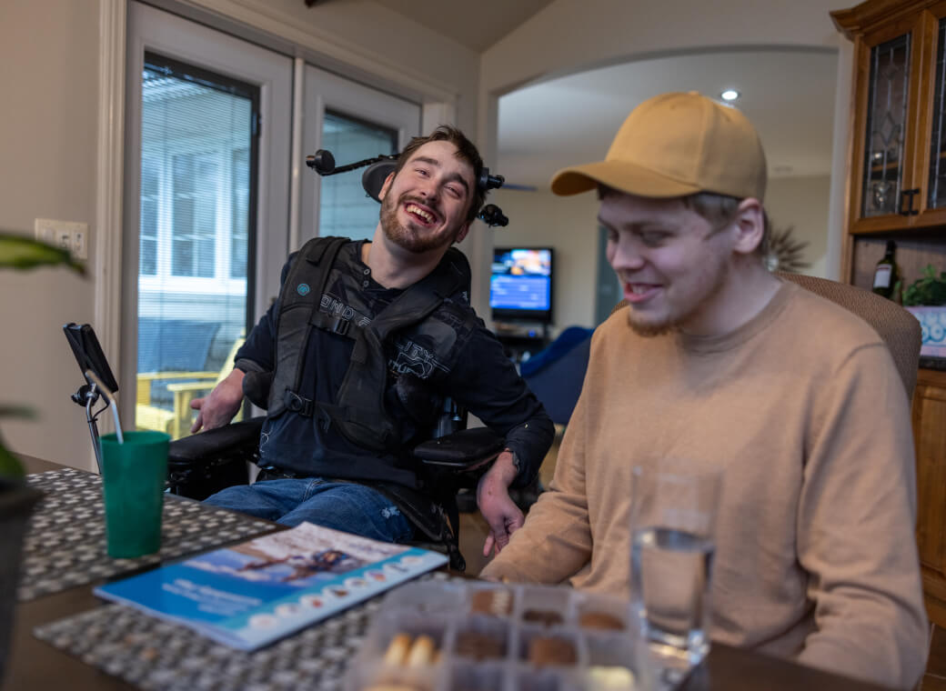 Two people at dining table